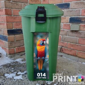 Colorful parrot is perched on a branch Green Bin Sticker