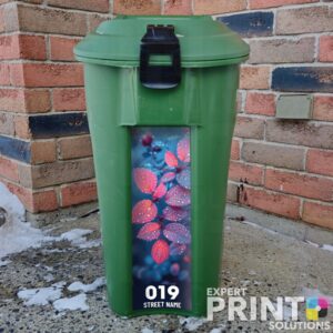 Pink and purple leaves with dew on them Green Bin Sticker