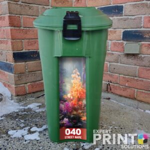 Colorful flowers blooming in forest Green Bin Sticker